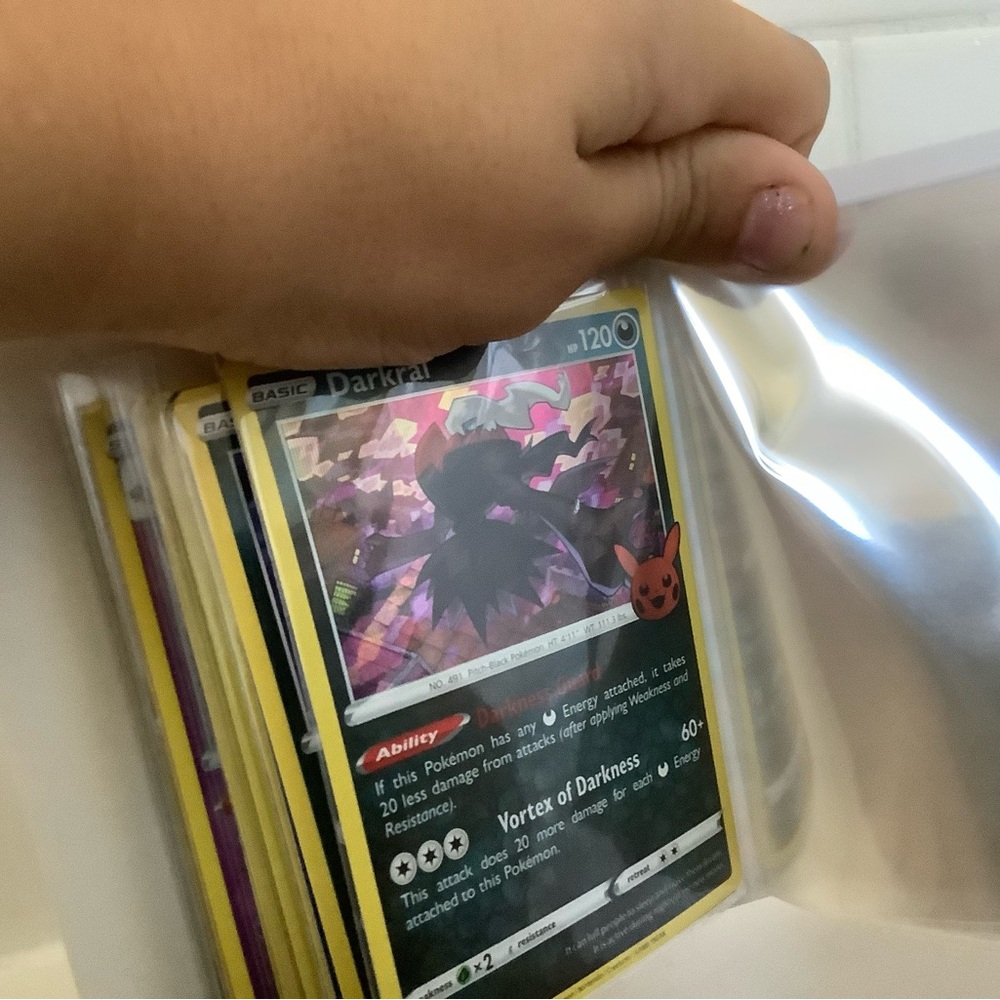 Full set of trick or trade Pokémon cards (includes small storage binder)